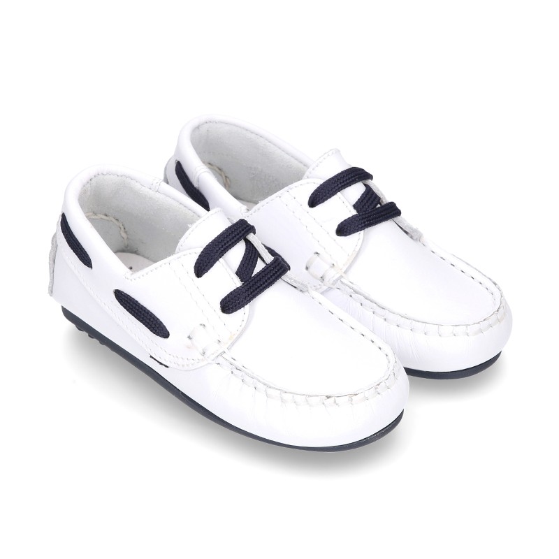 white soled boat shoes