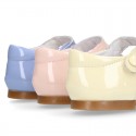Patent leather little Mary Janes with button fastening in PASTEL colors.