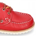 Classic kids leather Boat shoes with shoelaces and spring summer soles.