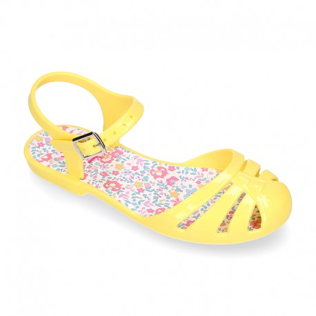 Girl Jelly ballet style shoes with buckle fastening and FLOWERS design for beach and pool use.