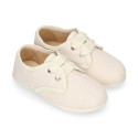 Blucher niño ceremonia en lona lino en color beige.