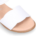 White nappa leather girl sandal shoes with braided engraved design.