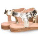 Gold nappa leather girl sandal shoes with braided engraved design.