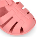 Children's barefoot jelly shoes with adhesive closure for the beach and pool.