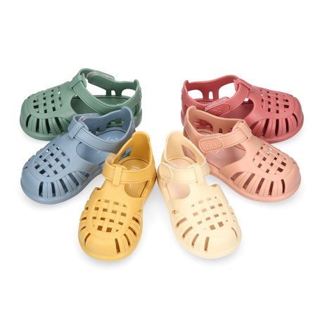 Classic Kids jelly shoes for Beach and Pool use in SOLID colors with hook and loop strap closure.