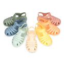 Classic Kids jelly shoes for Beach and Pool use in NEW SOLID colors with hook and loop strap closure.