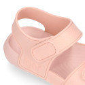 Kids Clog jelly shoes style in solid colors with double hook and loop strap closure design.