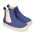 BAREFOOT Kids ankle shoes with elastic band and side zipper closure.