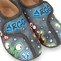 Wool cotton kids Home shoes with Monsters design and hook and loop strap closure.