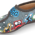 Wool cotton kids Home shoes with Monsters design and hook and loop strap closure.